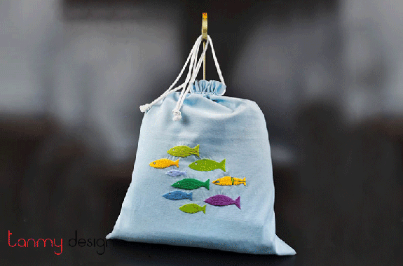 Laundry bag with fish embroidery